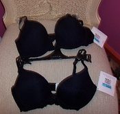 black bras displayed on a chair