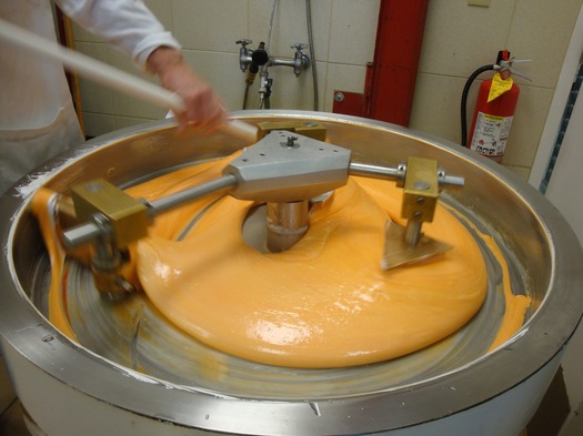 Stirring the orange cream.