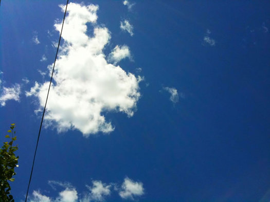 blue sky clouds power line