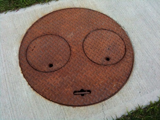 manhole cover face