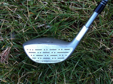 golf club head in grass