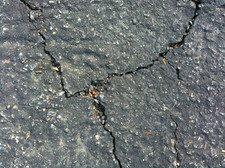 cracked driveway pavement