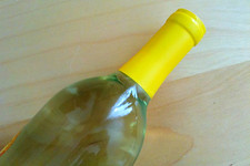 Thumbnail image for wine bottle top against table