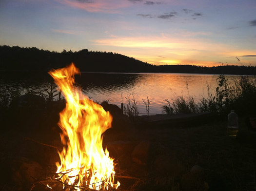 campfire at a lake