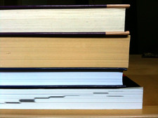 books stacked on desk