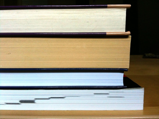 books stacked on desk