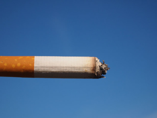 cigarette against a blue sky Flickr user Fried Dough CC