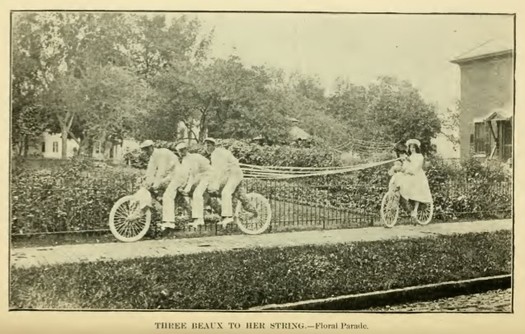 Saratoga Illustrated floral parade pulling bicycle