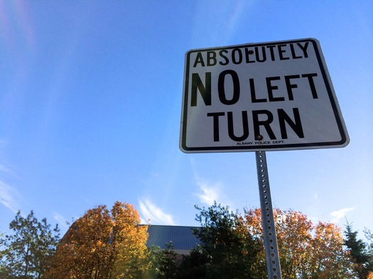 absolutely no left turn sign