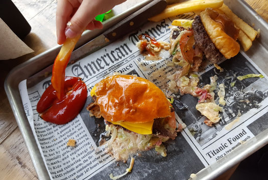 Crave burger on tray with fry