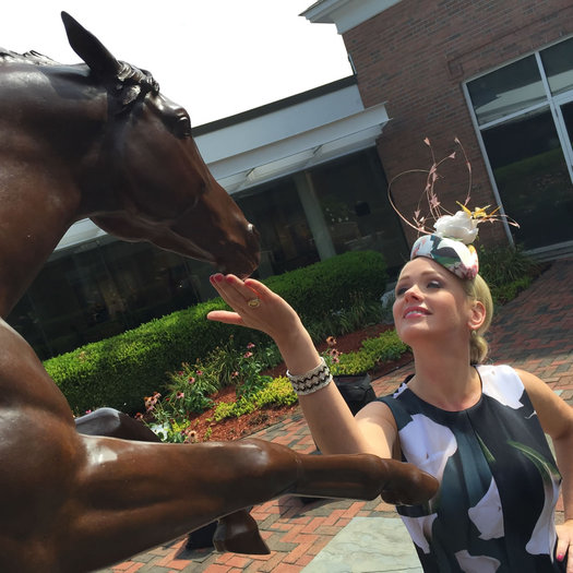 kate welshofer fascinator with horse statue