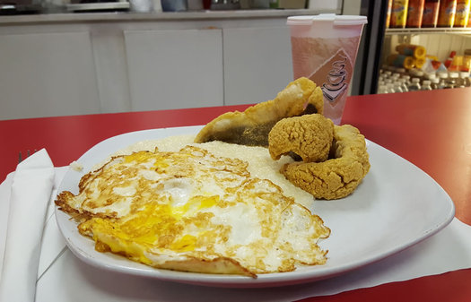 The Breakfast Spot fried fish grits eggs platter