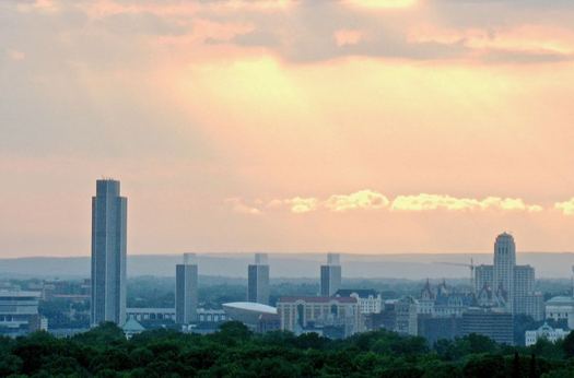 Albany skyline from E Greenbush sunset background