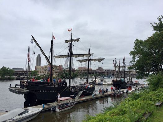 Nina and Pinta with Albany skyline in background