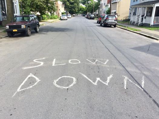 Slow Down on pavement of 3rd Street Albany