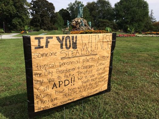 Washington Park tropical plants theft sign