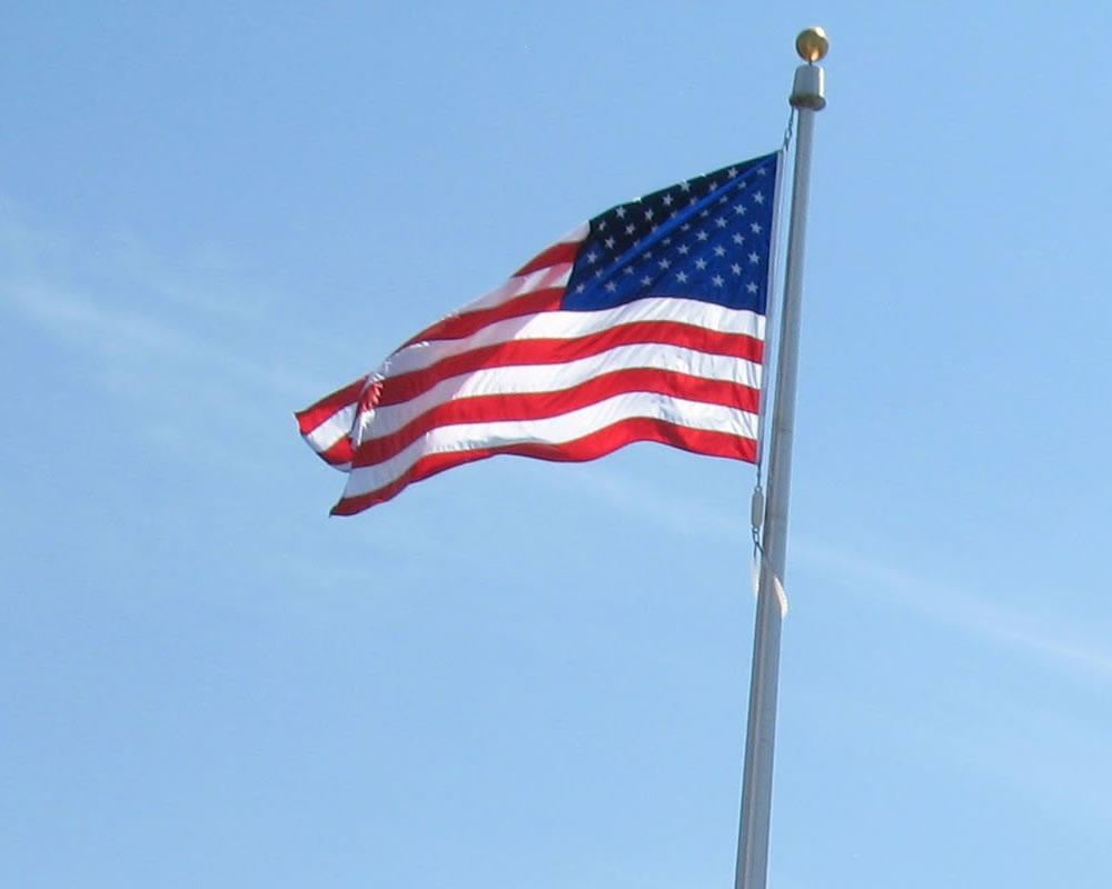 American flag blue sky