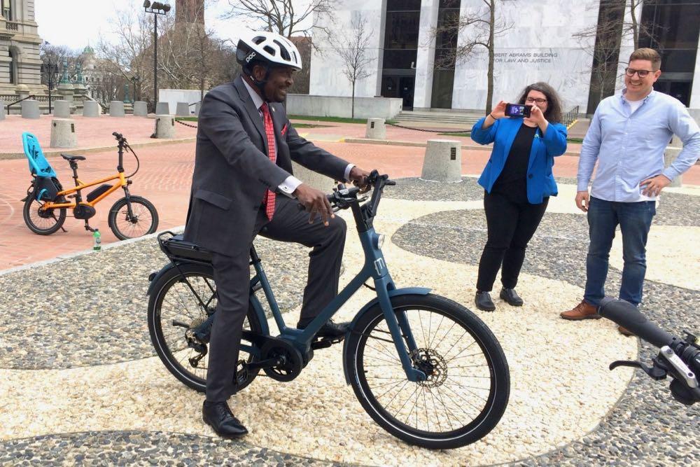 E-bikes_Assemblyman_Perry_on_bike.jpg