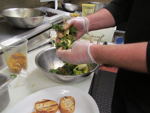 Ric Orlando tossing salad.jpg