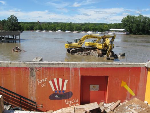 Troy Demoliton equipment in flood.jpg