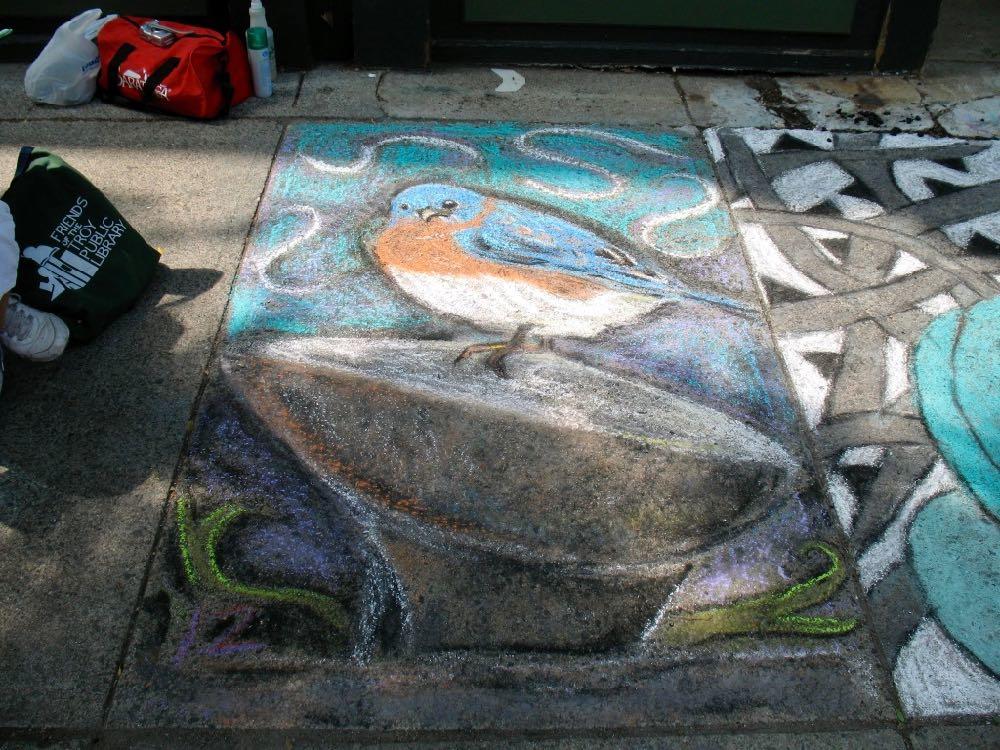 Troy sidewalk art 2011 bluebird on The Egg