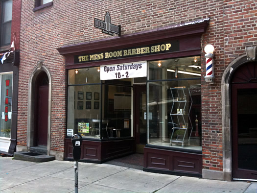 barber poll mensroom exterior