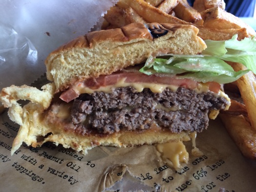 burger_chain_tasting_burgerfi_burger_cross_section.jpg
