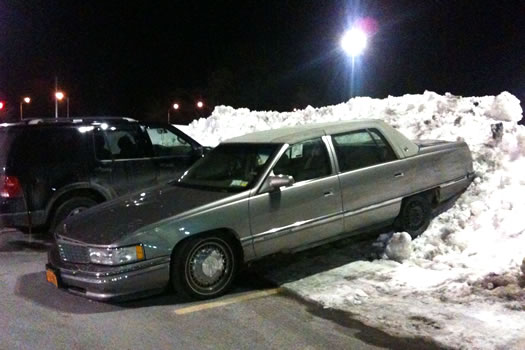 car parked on snowbank