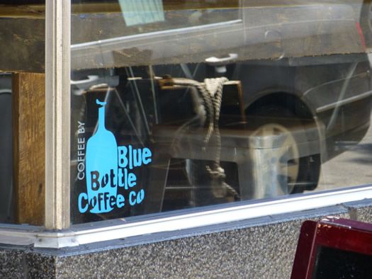 confectionery blue bottle sign