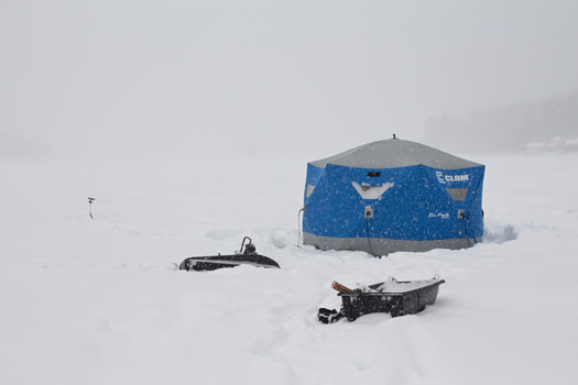 ice_fishing_shanty_on_snowy_lake.jpg