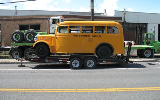 little yellow school bus side view