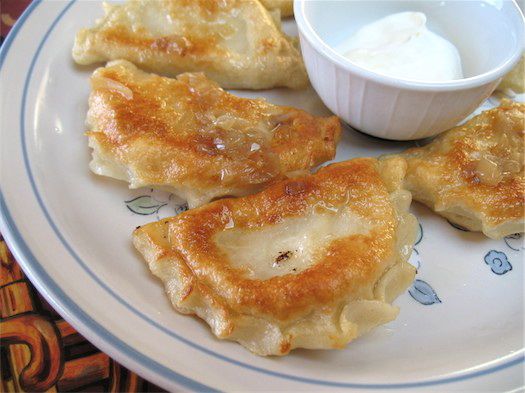 a plate of pierogi at Muza Diner