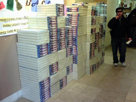 stacks of phone books as tall as a man