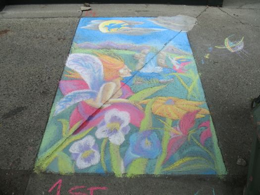 sidewalk art of a nymph in a flower with a waterfall