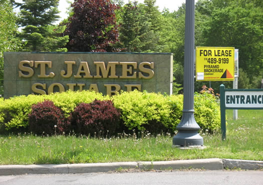 st james square sign overgrown